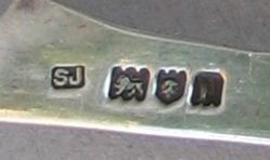 silver buckle: hallmarks London 1910, maker SJ