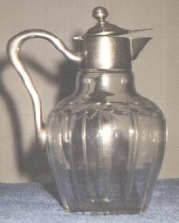 cut glass and silver claret jug