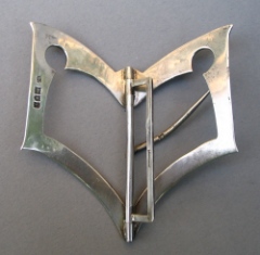 silver buckle: London 1910, maker SJ