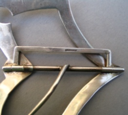 silver buckle: London 1910, maker SJ