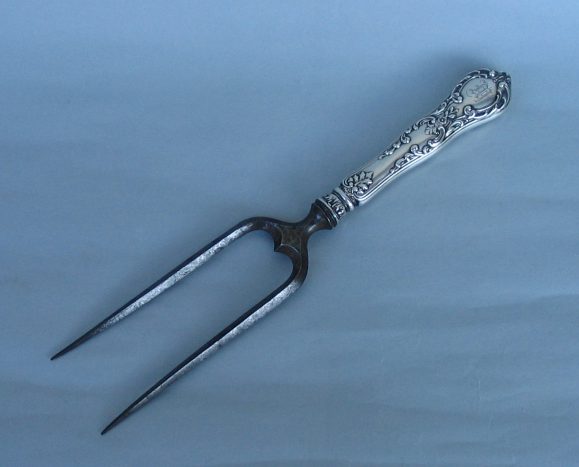 Gorham roast fork 
with silver handle