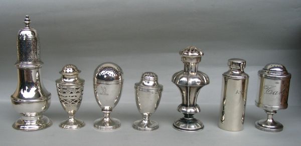a small collection of silver shakers ranging from mid 18th to mid 20th century