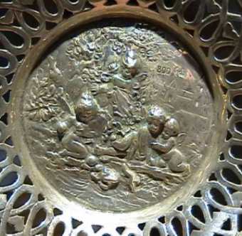  central bowl embossed silver with 4 cherubs