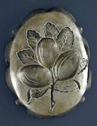  lower face of embossed silver sweetmeat dish