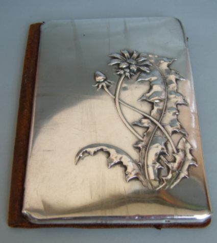 wallet's 
silver
cover