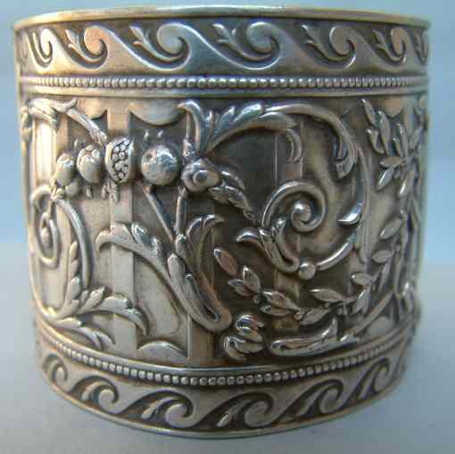 Italian antique silver napkin ring floral embossing