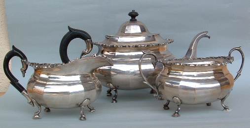silver
milk creamer,
teapot and
sugar bowl