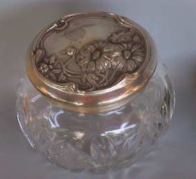 spherical cut glass and antique silver dresser jar